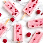 regular ice cream with raspberries on a stick