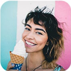 girl smiles and eats gelato
